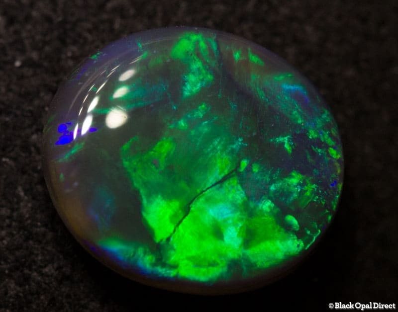 0.94 ct black opal 8x7x2.5mm