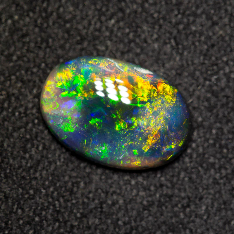 0.94 ct black opal 9x6.2x2.6mm