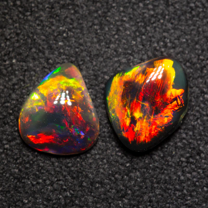 0.94 ct black opal pair 6.9x5.9x2.4mm