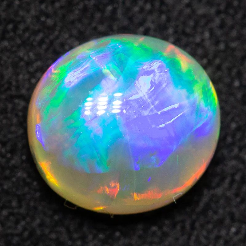 0.94 ct crystal opal 6.9x6.5x3.7mm