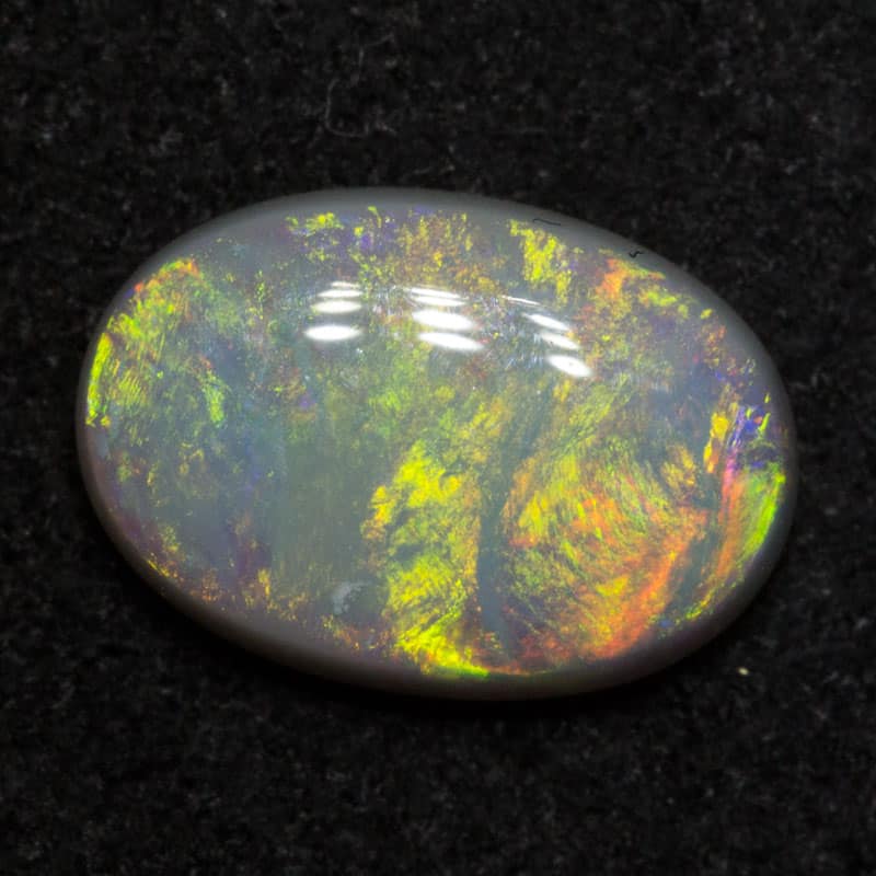 0.94 ct dark opal 8.6x6x2.7mm