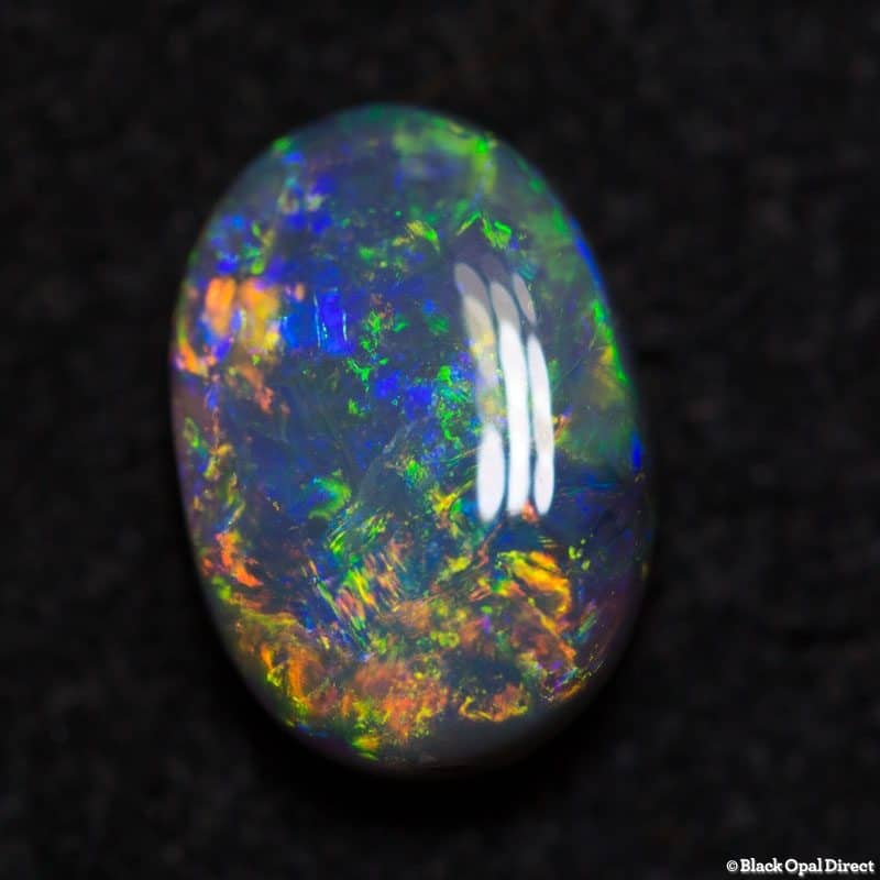 0.94 ct semi black opal 8x5.5x3mm