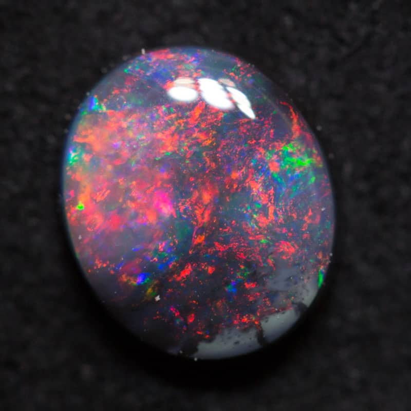 0.95 black opal 7.3x6.3x3mm