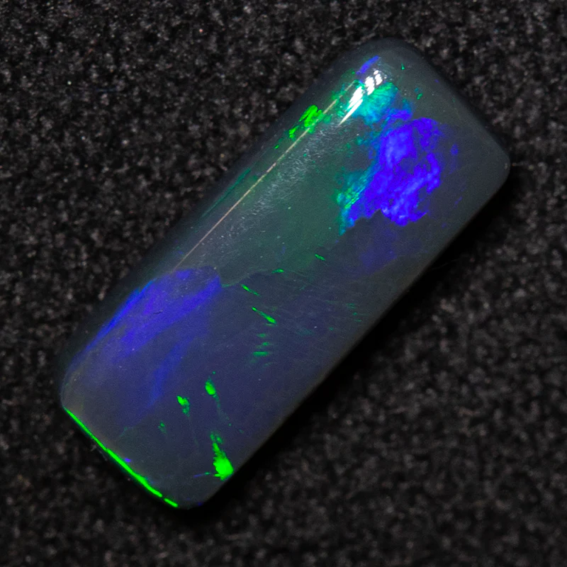 0.95 ct black opal 10.4x4.3x2.4mm