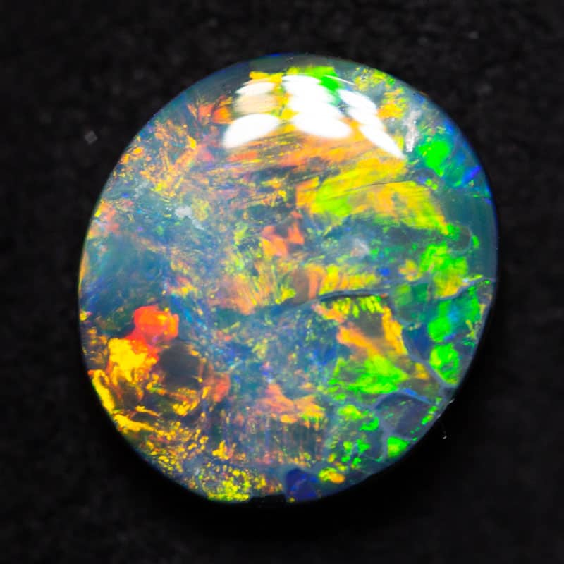 0.95 ct black opal 8.1x7.1x2.4mm
