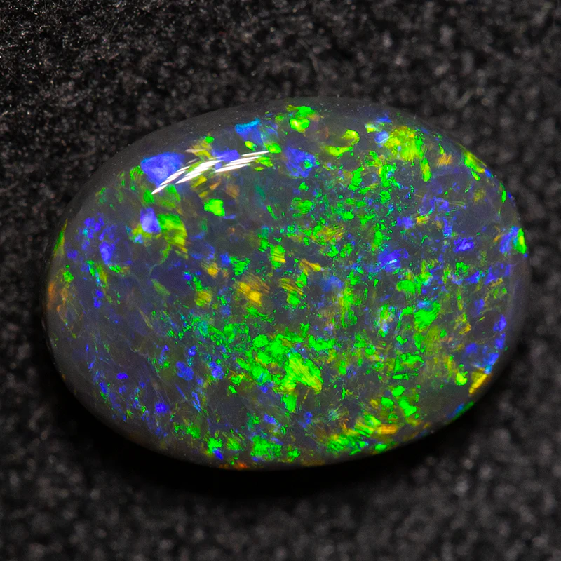 0.95 ct black opal 8x6x2.8mm