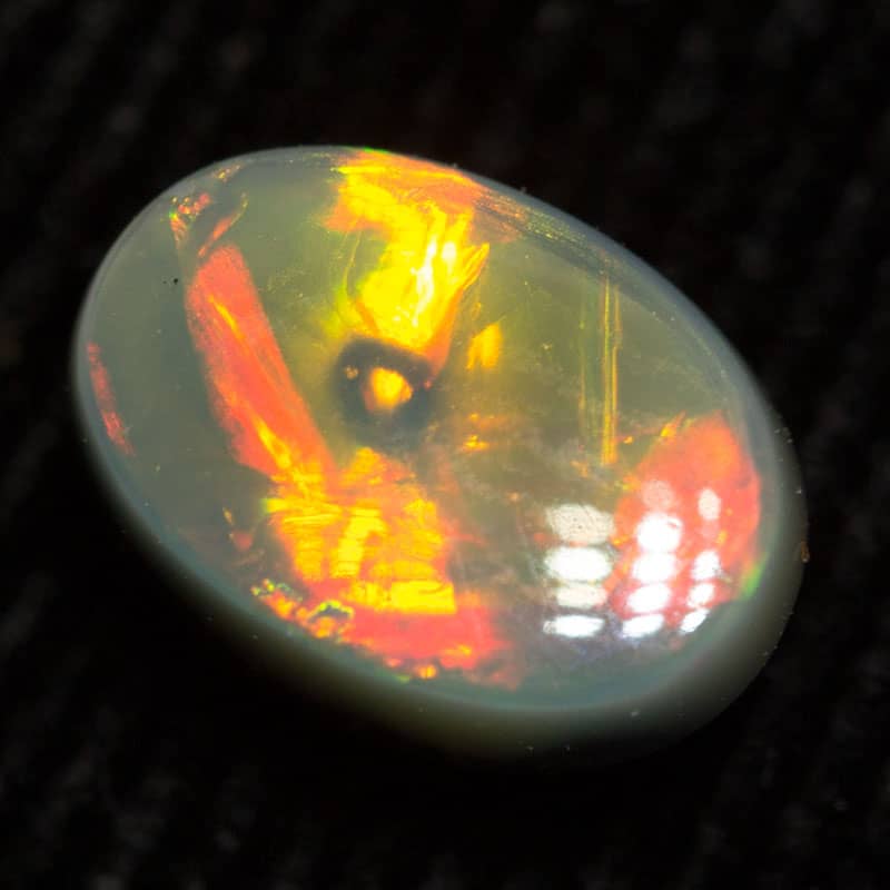 0.95 ct dark opal 7.8x5.5x3mm