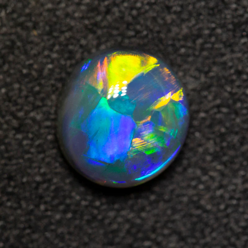 0.95 ct gem black opal 6.9x6.3x3.5mm