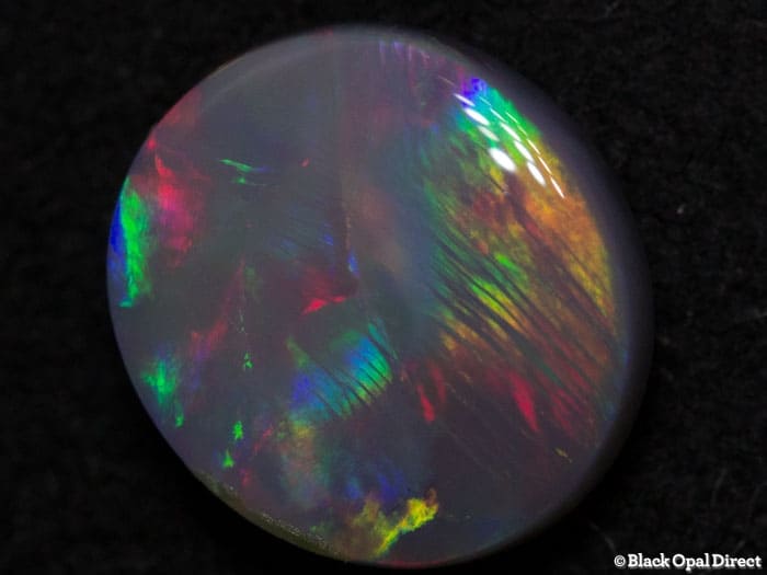 0.95 ct semi black opal 7.5x7x3mm