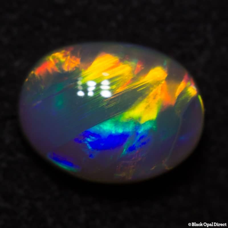 0.95 ct semi black opal 7x5x3mm