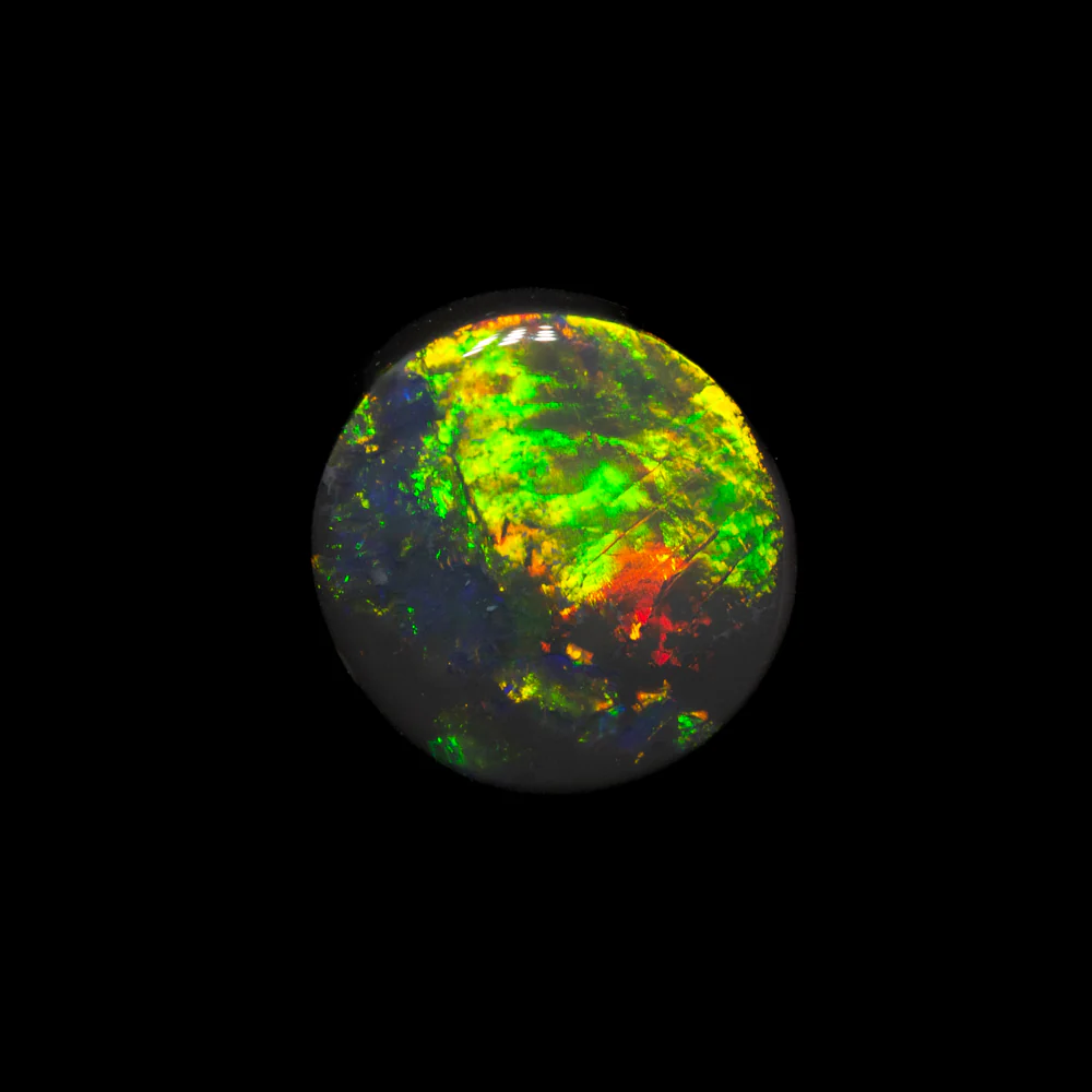 0.96 ct black opal 7.2x6.8x2.7mm