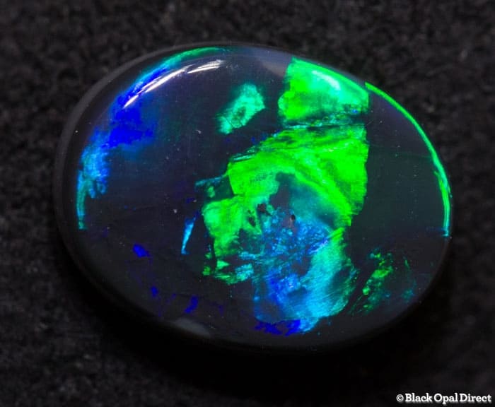 0.96 ct black opal 8x6x2.5mm