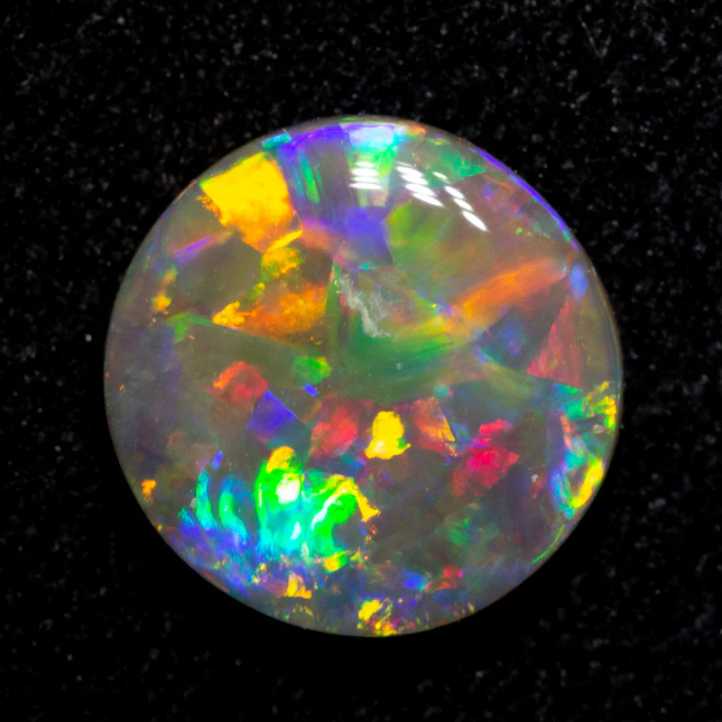 0.97 ct dark opal 7.6x7.5x2.5mm