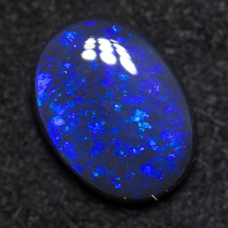 0.97ct black opal 8.5x6x2.5mm