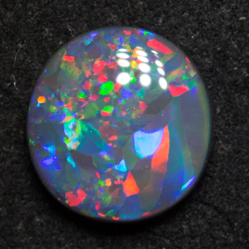 0.98 ct black opal 7.8x7.4x2.7mm