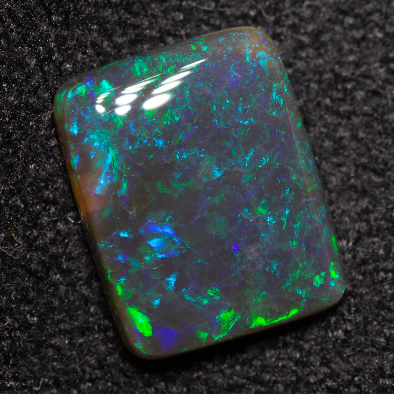0.98 ct black opal 8.3x6.6x2.1mm