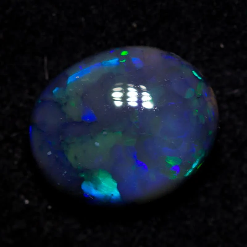 0.98 ct black opal 8x6x2.5mm