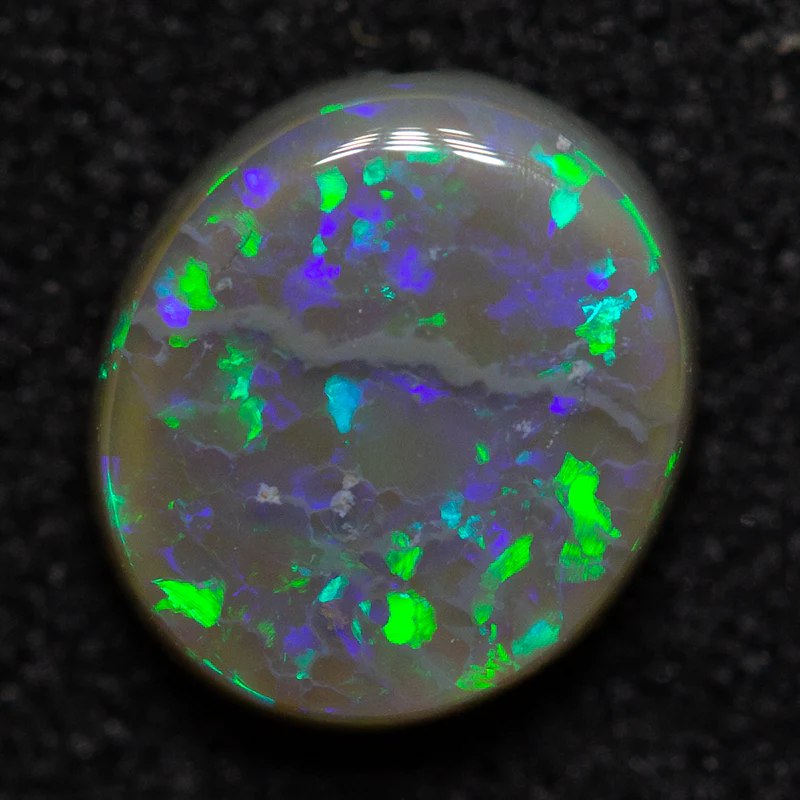 0.98 ct dark opal 7.2x6.4x3mm