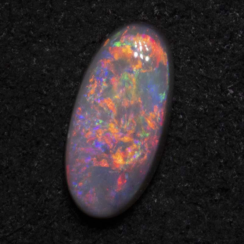 0.98 ct dark opal 9.7x4.7x3.2mm