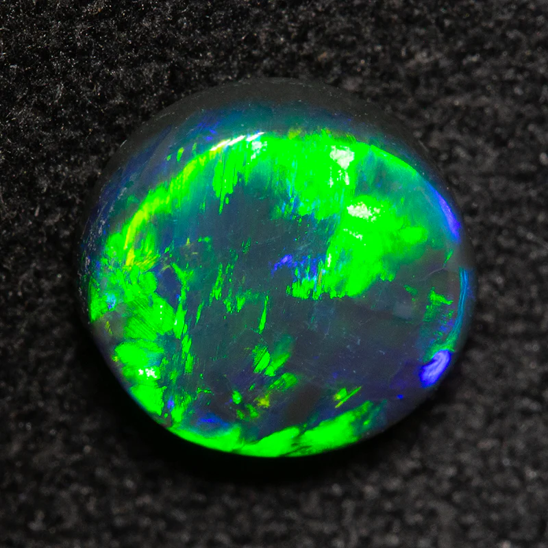 0.99 ct black opal 7.1x6.7x3mm