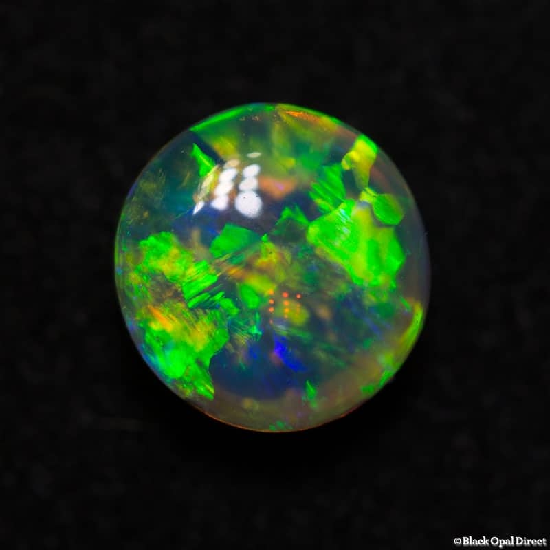 0.99 ct gem double sided crystal opal 6mm round x 4mm