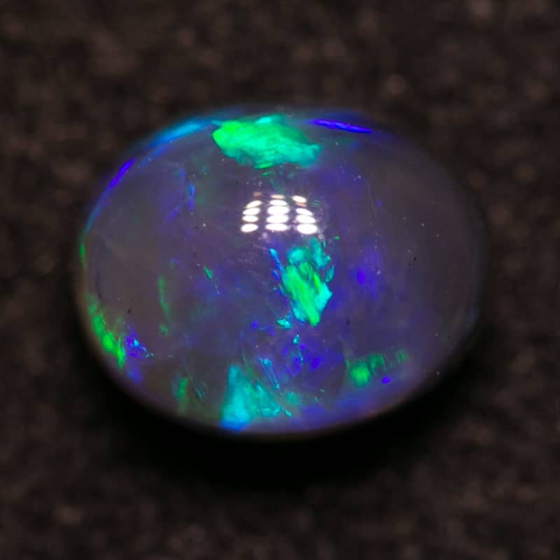1.00 ct black opal 6.5x5x4.5mm