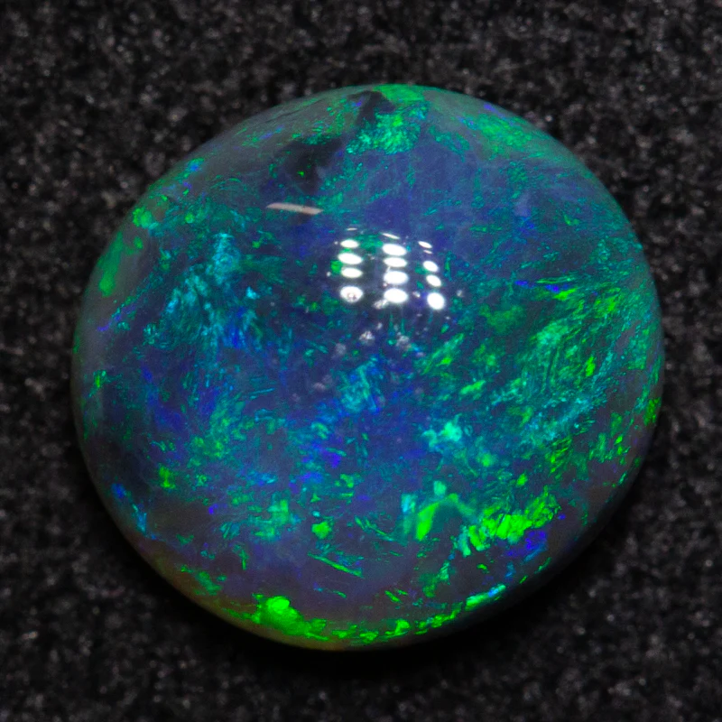 1.00 ct black opal 7.4x6.9x3.3mm