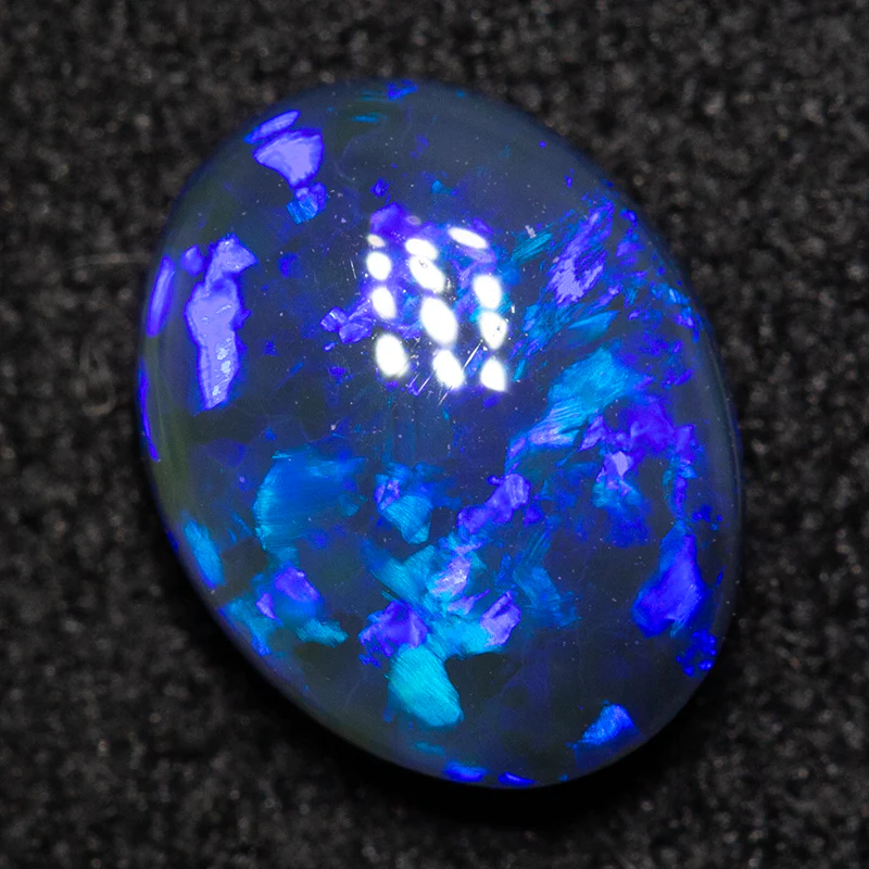 1.00 ct black opal 8.2x6.5x3mm
