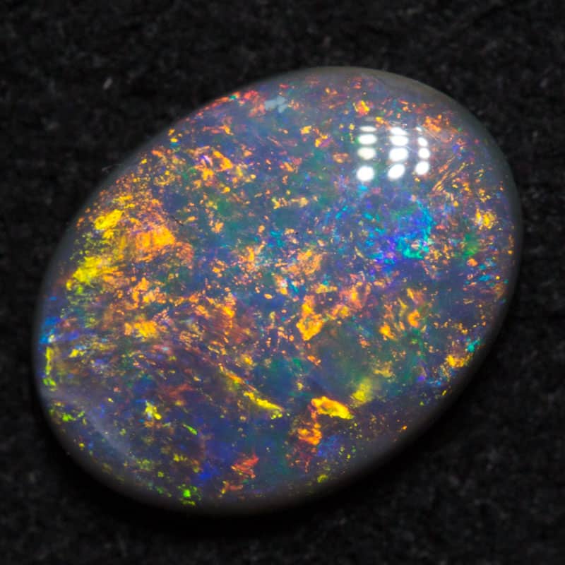 1.00 ct black opal 8.5x7.5x3mm