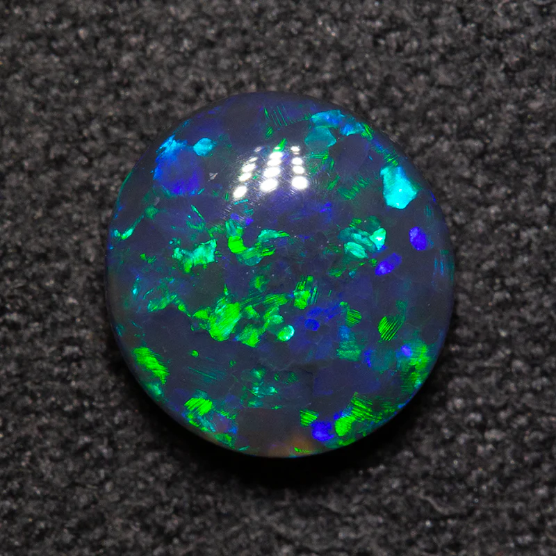 1.01 ct black opal 7.1x6.8x3.4mm