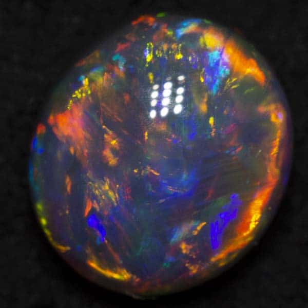 1.01 ct black opal 7x6.3x4mm