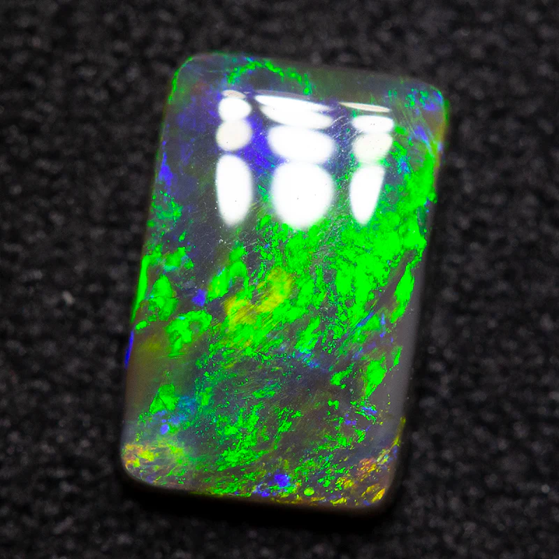 1.01 ct black opal 8.4x5.6x2.4mm