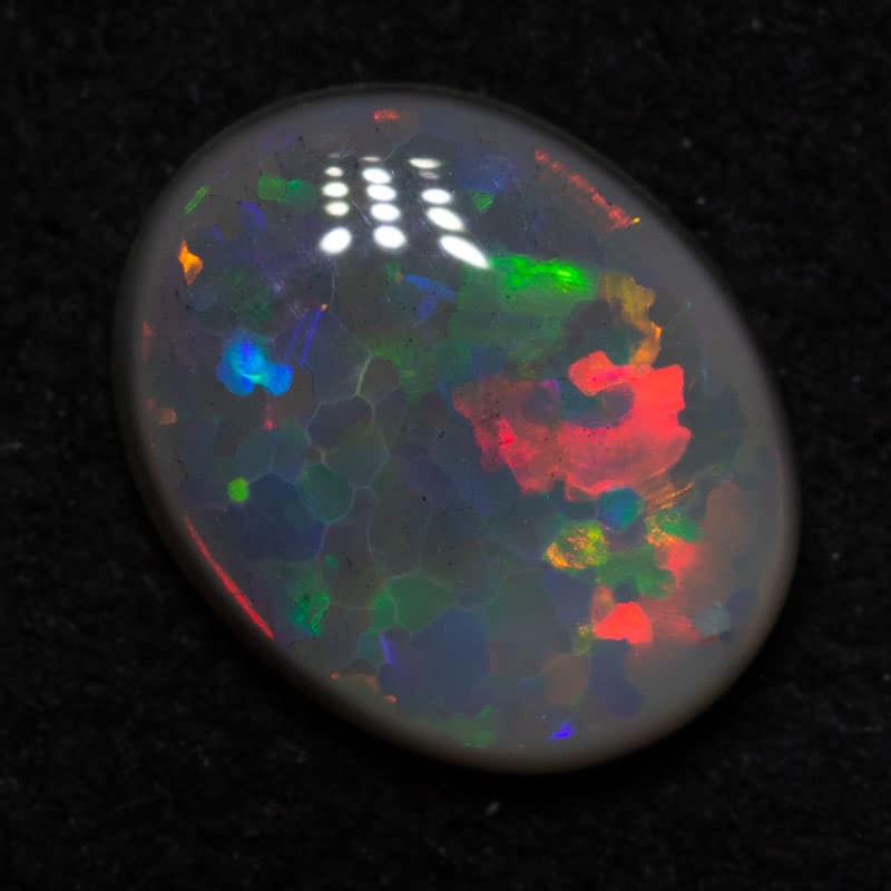 1.02 ct dark opal 8.4x6.7x2.7mm