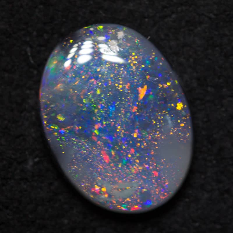 1.02 ct dark opal 9x7x2mm