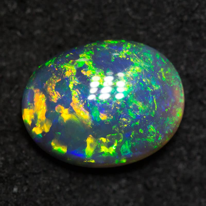 1.03 ct black opal 8x6.2x3.2mm
