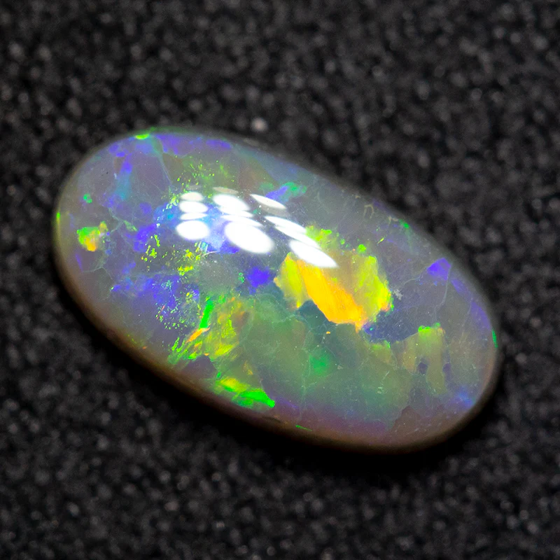 1.03 ct dark opal 9.3x5.1x3.2mm