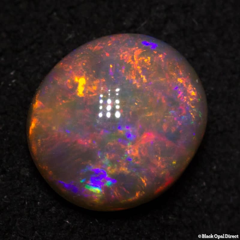 1.03 ct semi black opal 7x6x3.5mm