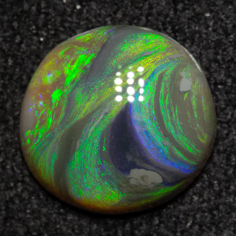 1.04 ct black opal 8.1x7.8x2.8mm