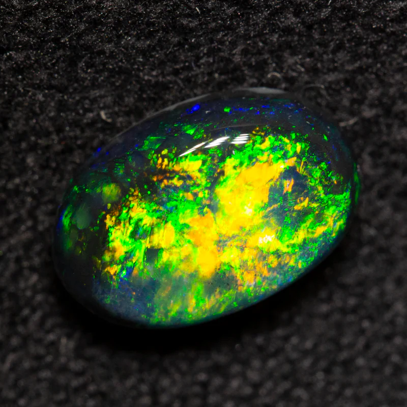 1.04 ct black opal 8.4x5.5x3.4mm