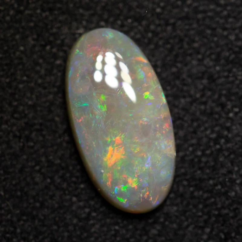 1.04 ct dark opal 10.6x5.5x2.5mm