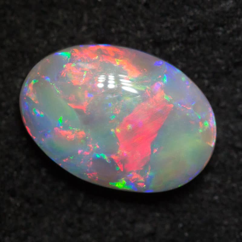 1.04 ct dark opal 8.4x5.9x3.1mm