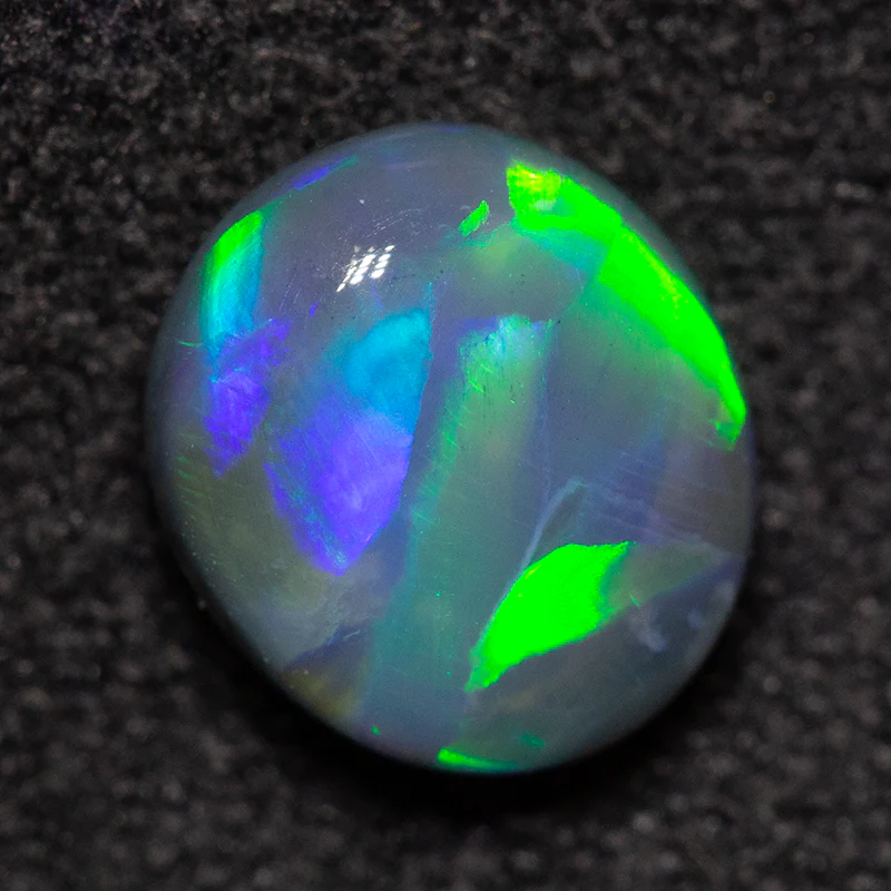 1.05 ct black opal 7.4x6.5x3.6mm