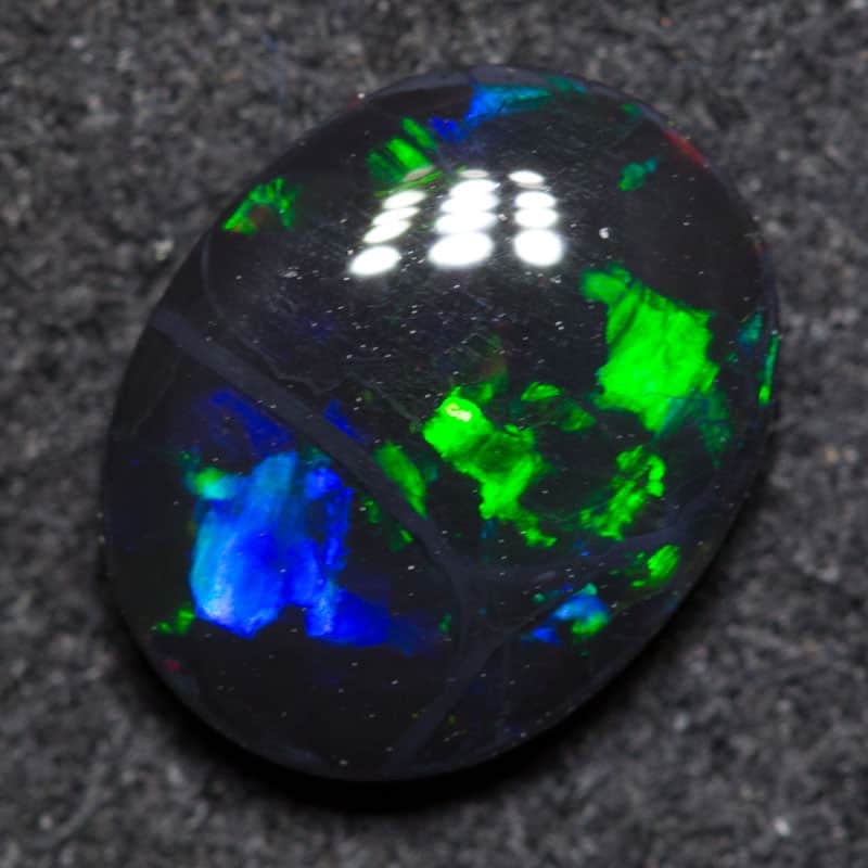 1.05 ct black opal 8.7x6.9x2.8mm