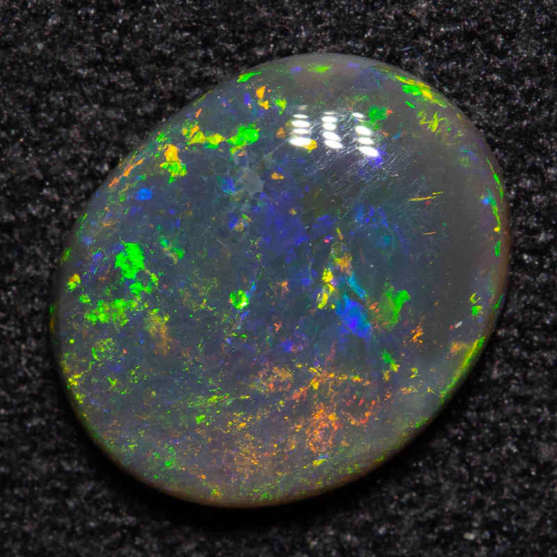 1.05 ct black opal 8.8x7.3x2.3mm