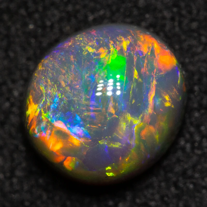 1.05 ct dark opal gem 6.5x6x4mm