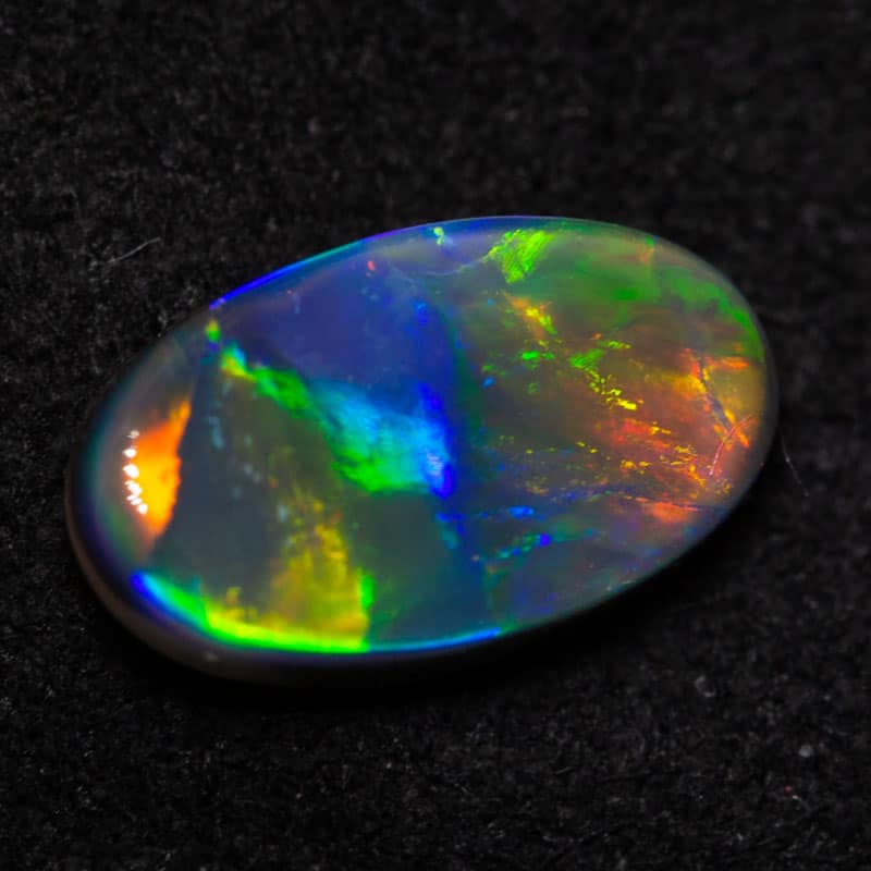 1.05ct black opal 9x5.5x3mm