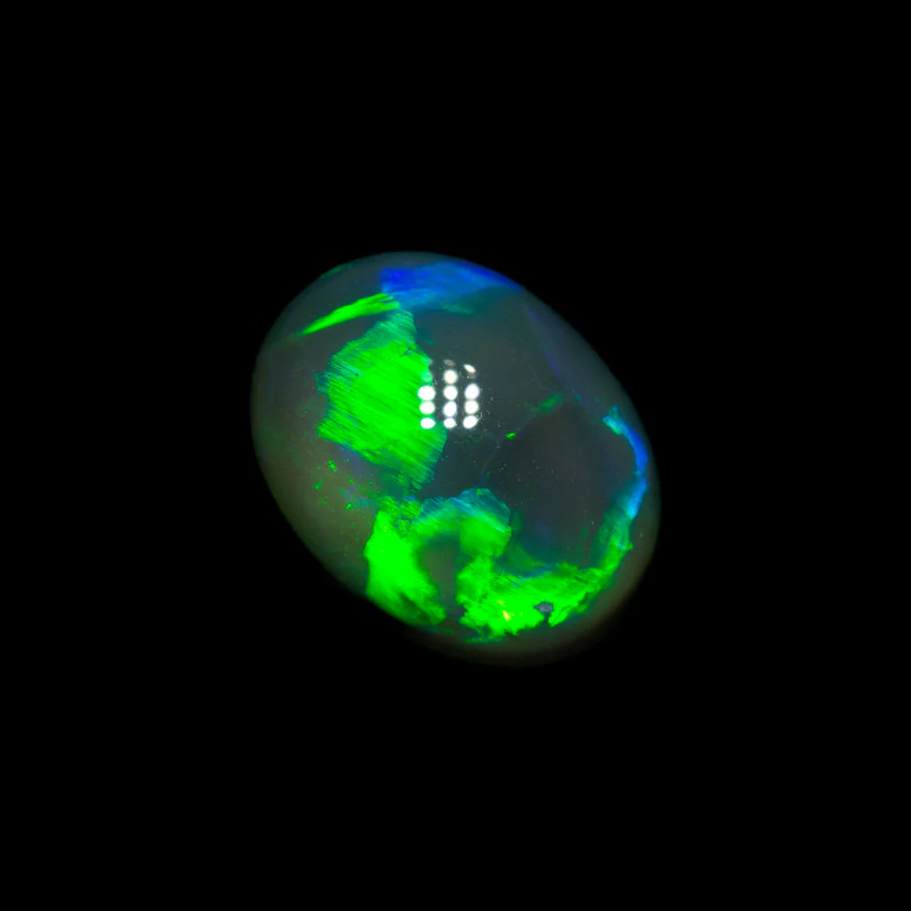 1.06 ct black opal 7.1x5.5x4.3mm