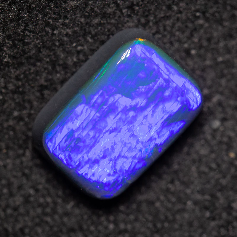 1.06 ct black opal 7.8x5.5x2.8mm