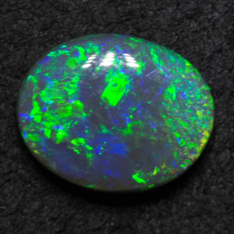1.06 ct black opal 8.2x6.6x2.9mm