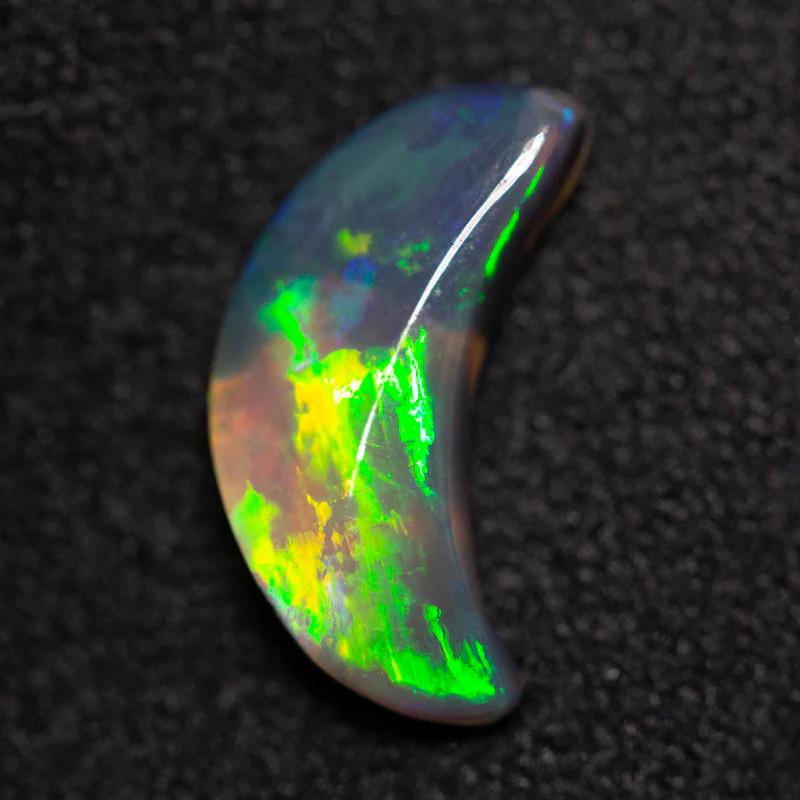 1.06 ct black opal moon 11.2x5.8x2.8mm